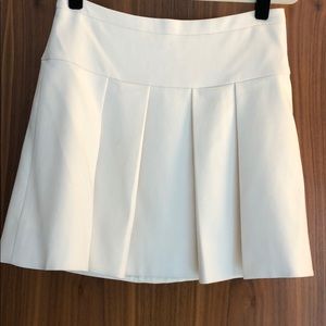 Ivory pleated skirt from J Crew Factory.